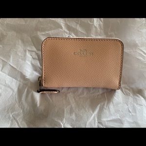 Coach light pink card wallet